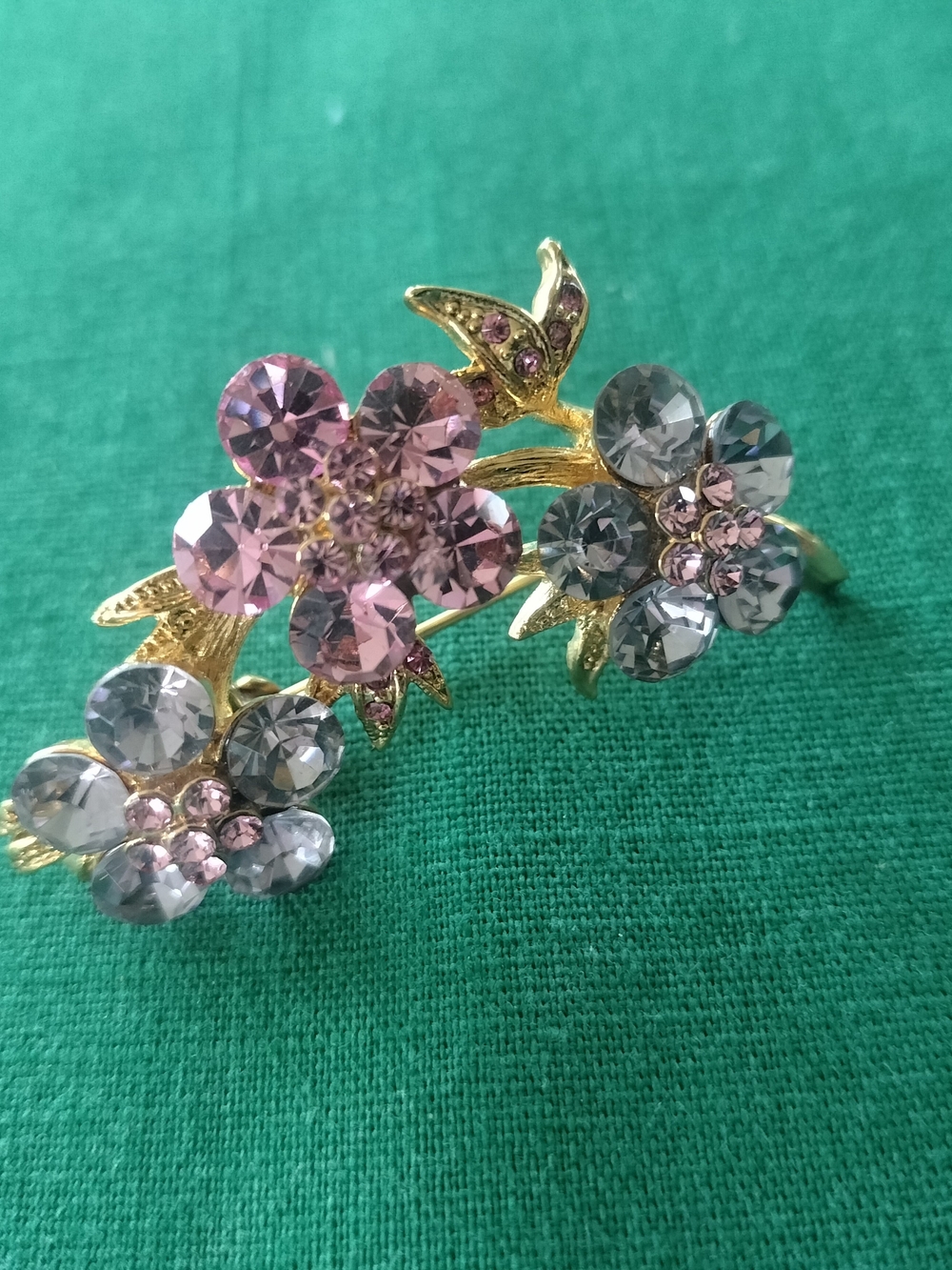 Gold-Tone Floral Crystal Brooch with Pink and Gray Stones